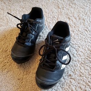Little boys Adidas baseball cleats